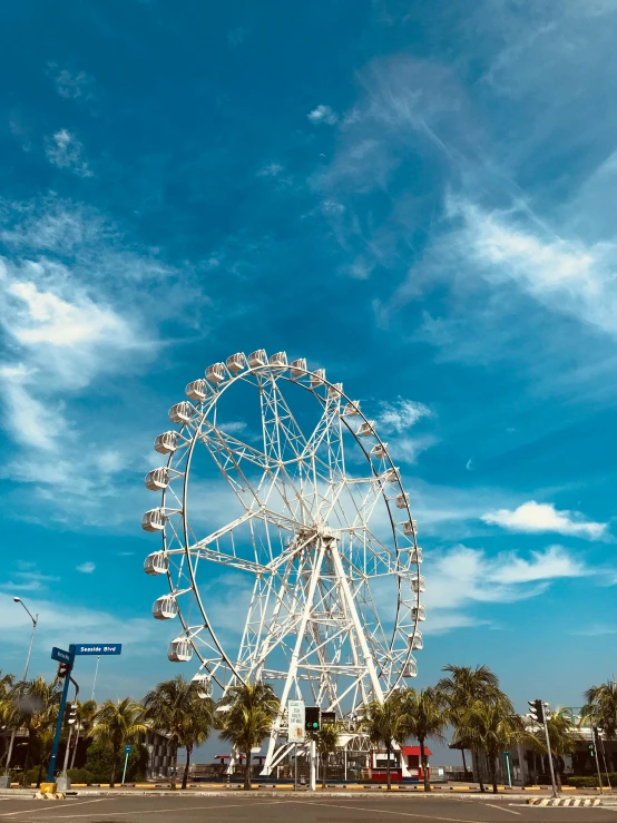 a ferris wheel in the middle of a street