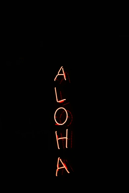 a red neon sign with the word aloha above it