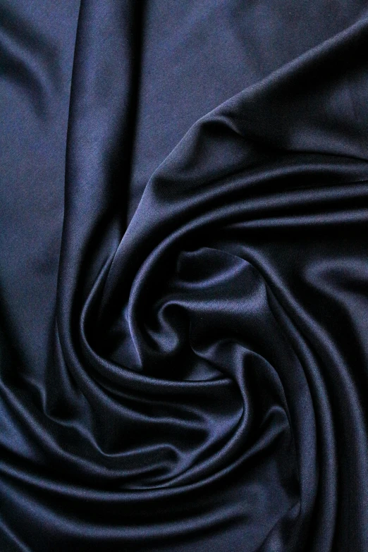 a black plain fabric with a diagonal striped design