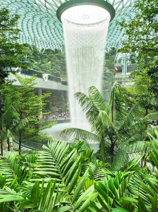 the view from below of a garden fountain