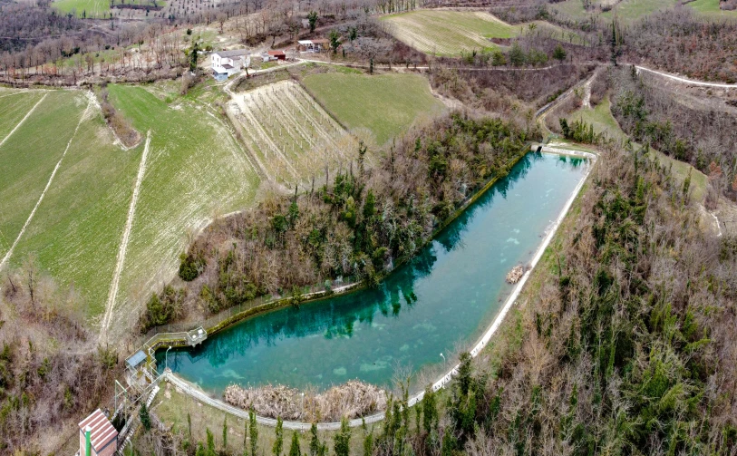 an aerial po of the water inside of a pond