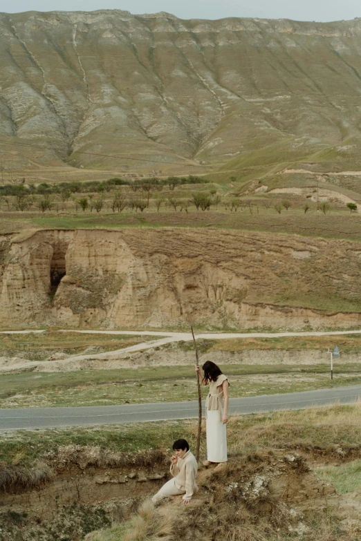 a person that is standing in the dirt