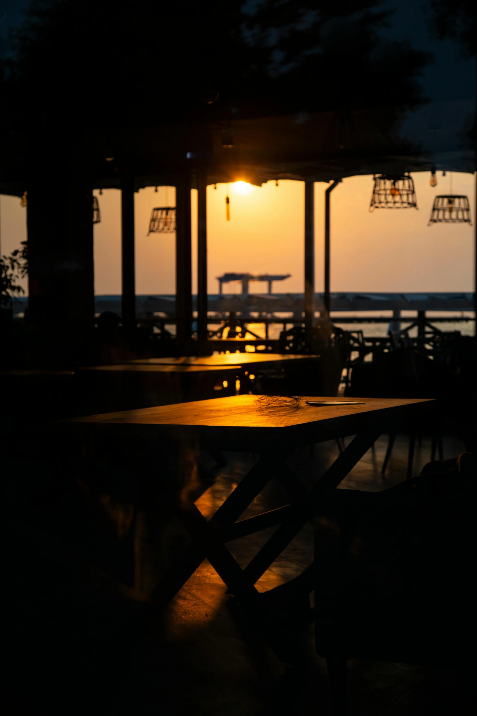 this is a long s of a sunset from a pier