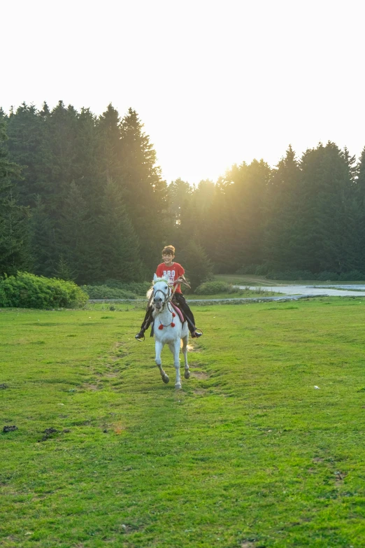 a couple of people that are on some horses