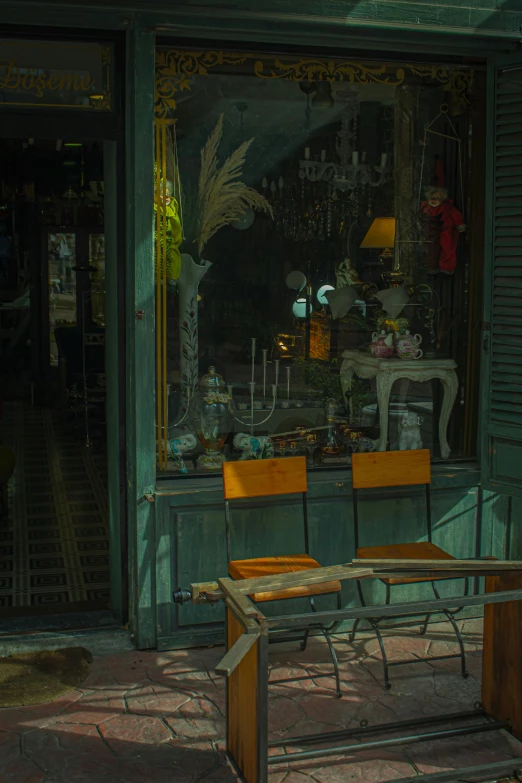 a street scene with focus on a wooden bench and windows