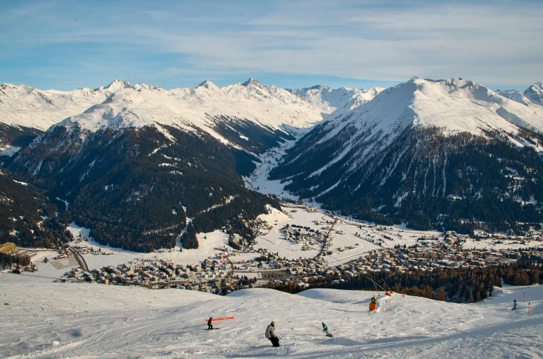 skiers are enjoying the snow in the mountains