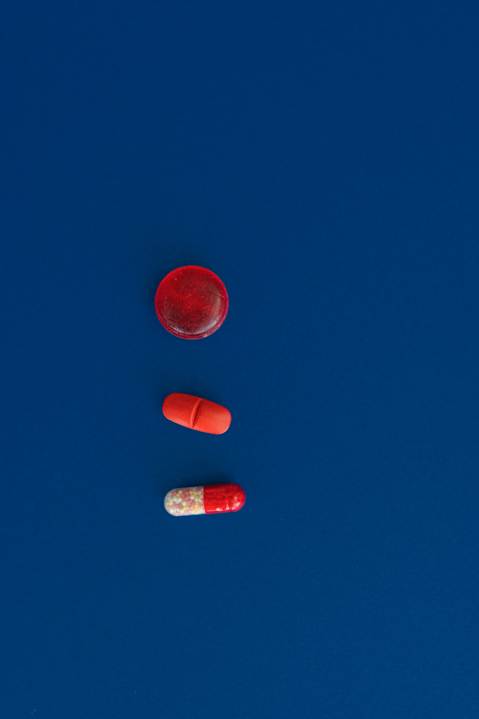 three pills are laying out in the sky
