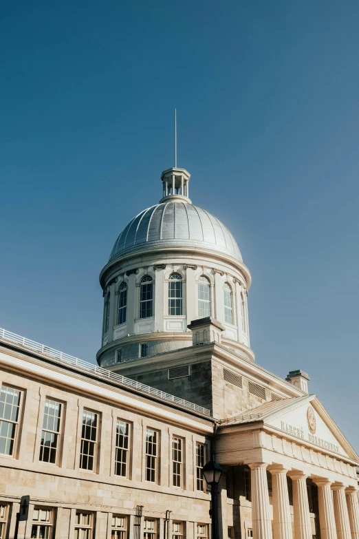 an old building has columns and is sitting on top of it