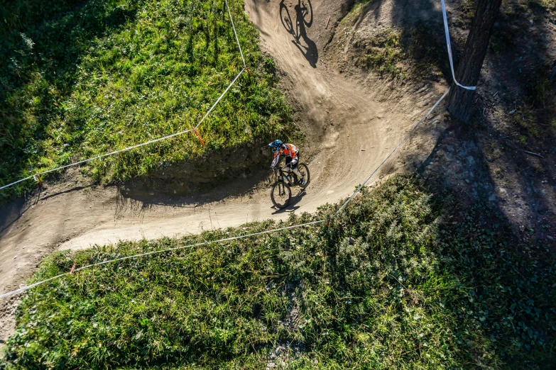 the bike rider rides the trails on his bicycle