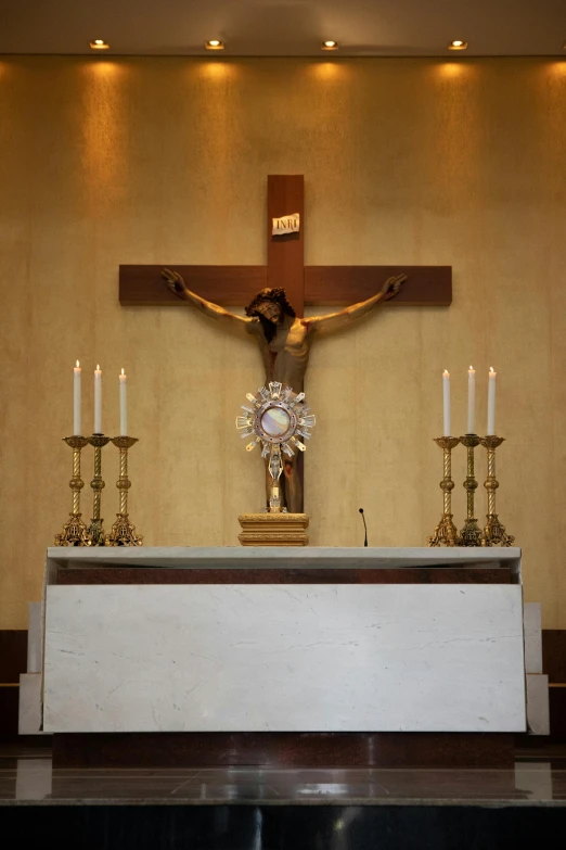 a crucifix with candles, cross and crosses in front