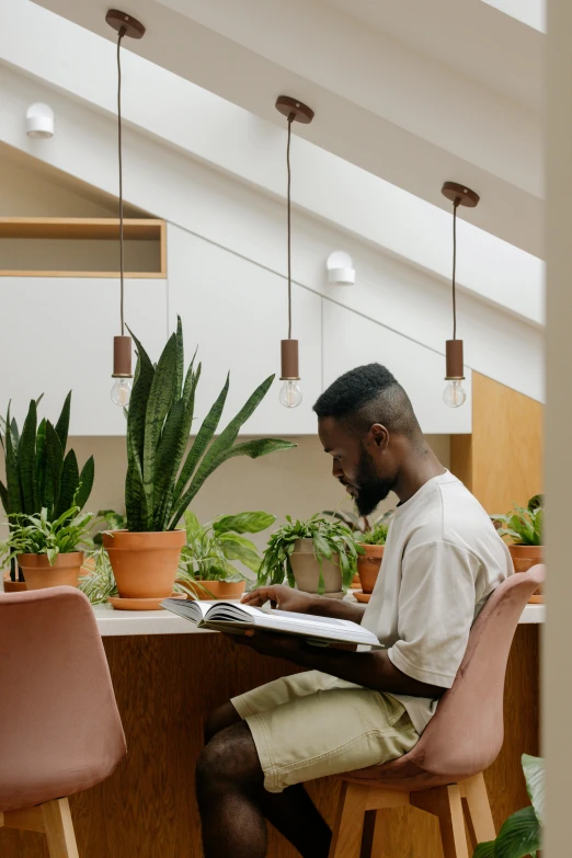 a man sitting at his desk in an office