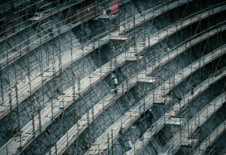 the exterior view of a stadium with scaffolding