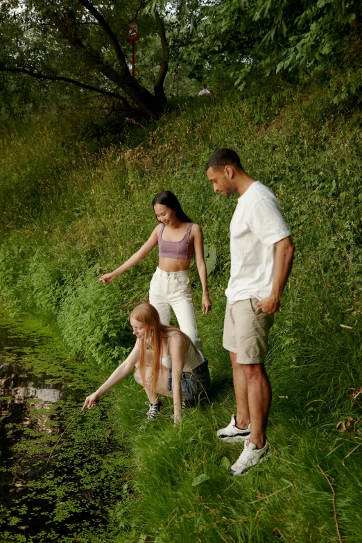 the couple are walking with their children