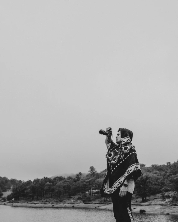 man in the process of flying an airplane on a cloudy day