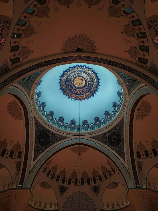 the ceiling in the center of the room has intricate designs