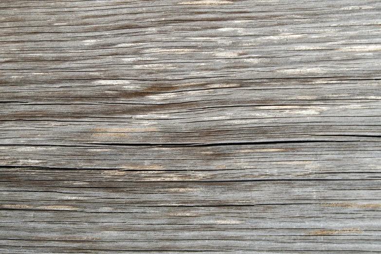 a piece of wooden wood that looks like it has been stained white