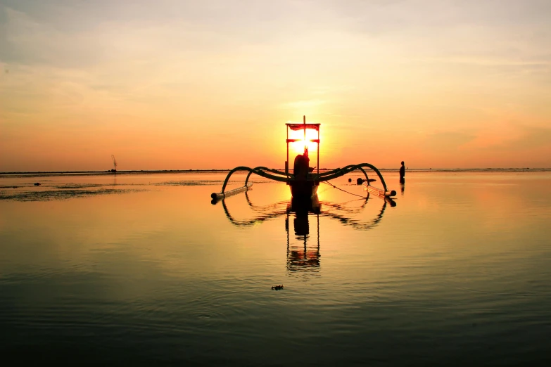 a boat that is sitting in some water