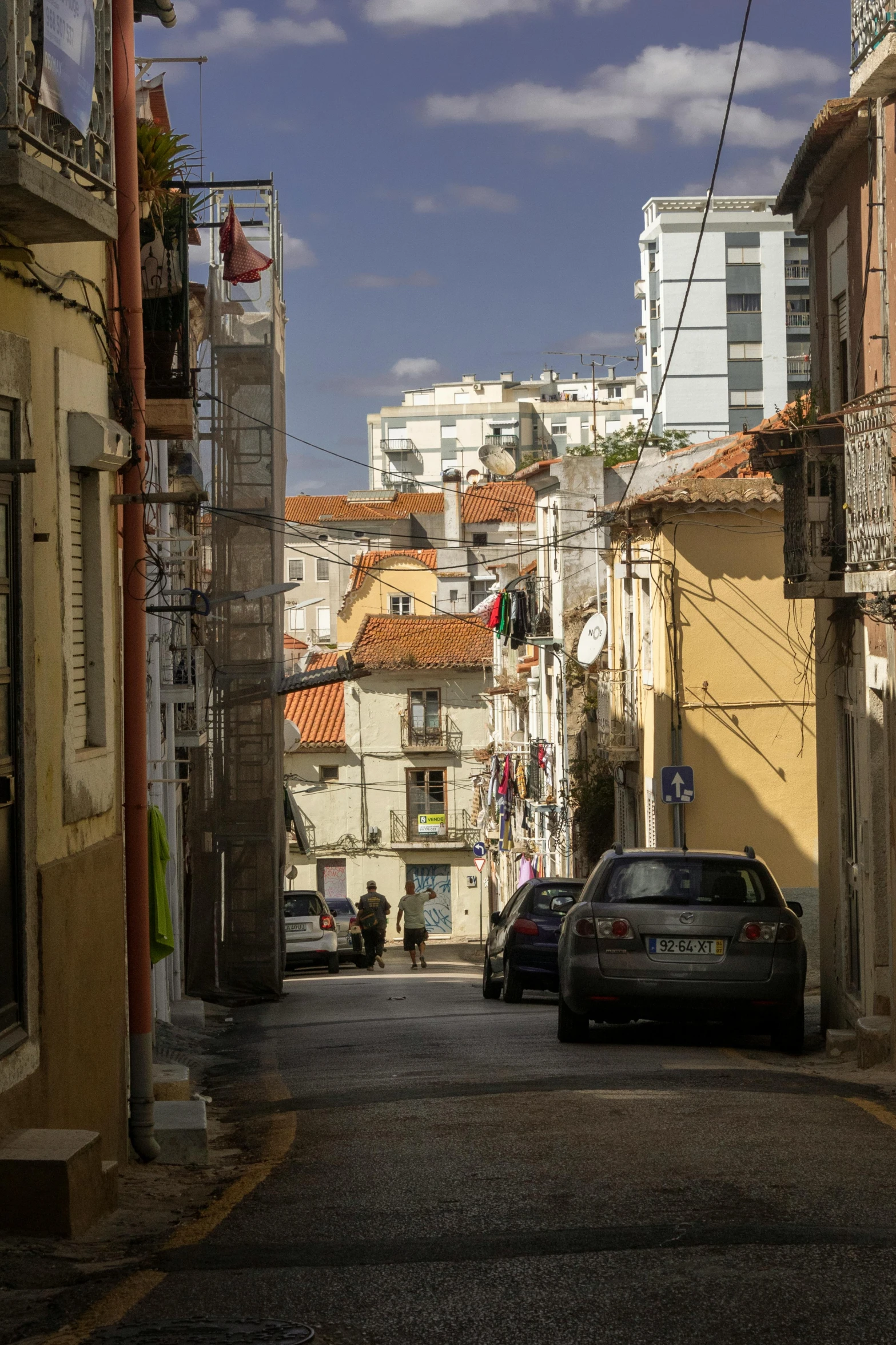 a street that has cars parked on the side