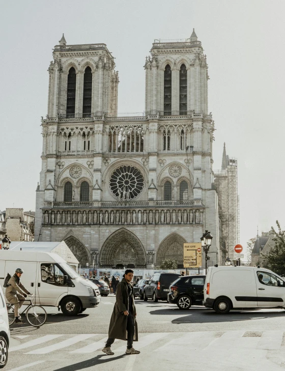 a large cathedral with an ornate clock on the front