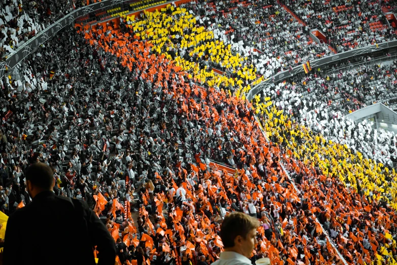 a soccer stadium filled with lots of people