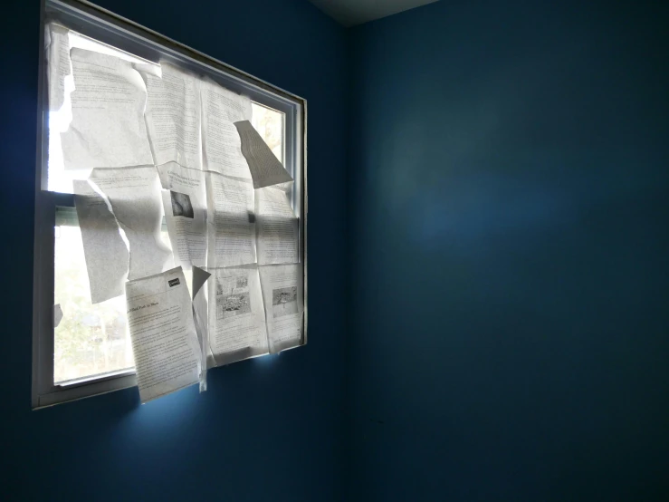 an image of a window with paper on it