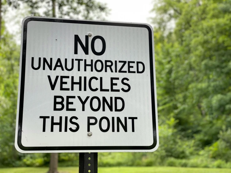 an in - vehicle vehicle warning sign placed on a pole