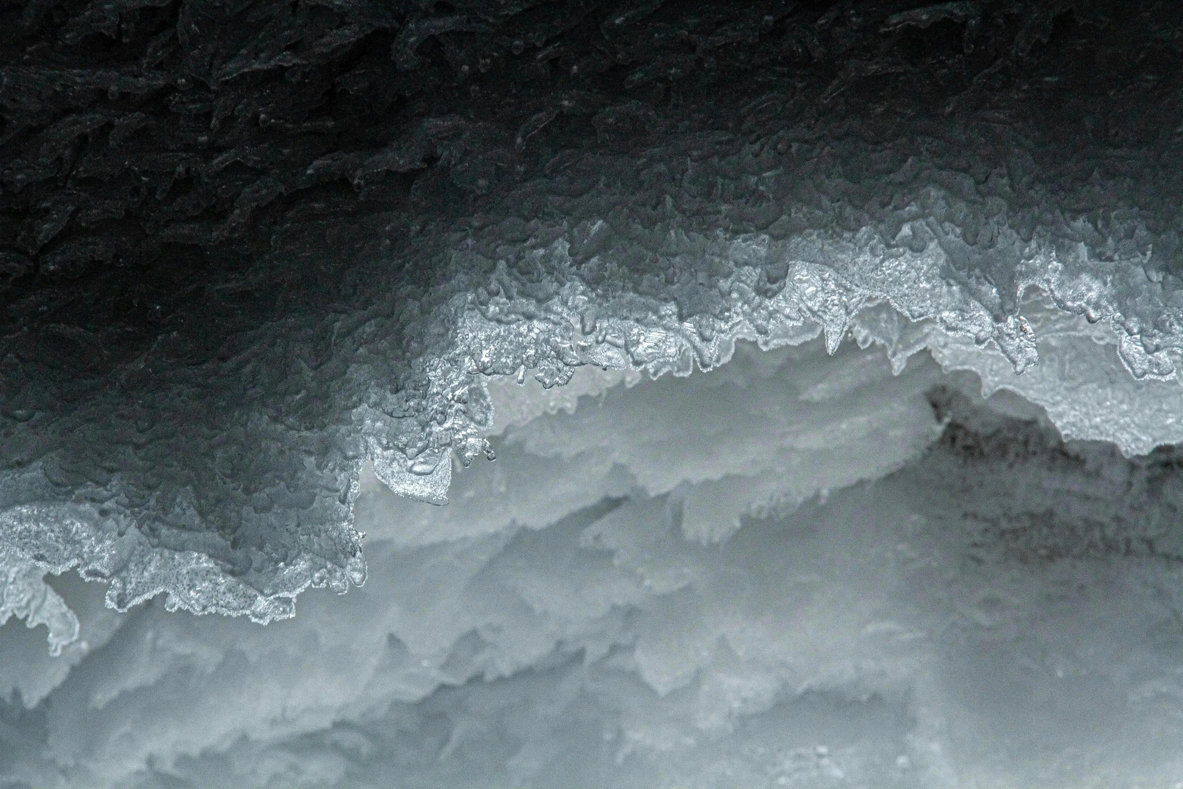 the ocean waves are made up of black and white paper