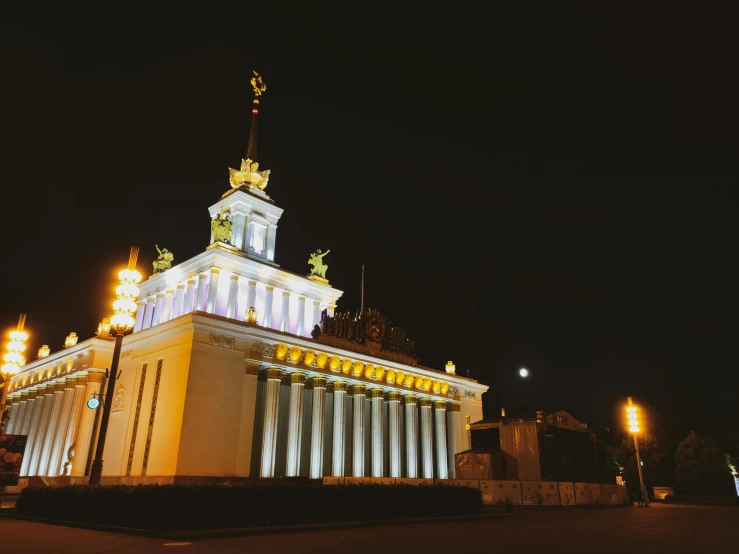 an elegant building lit up at night