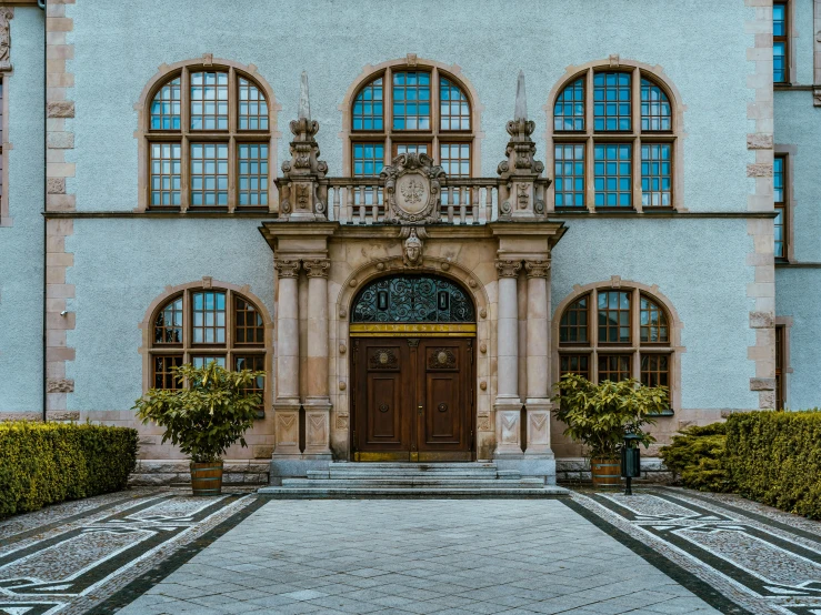 a large building with several windows and steps