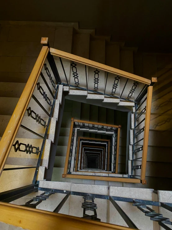 an elaborate stair railing made of metal bars