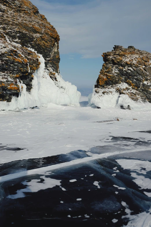 a large body of water with ice on it