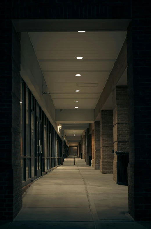 hallway with multiple doors and no people in it