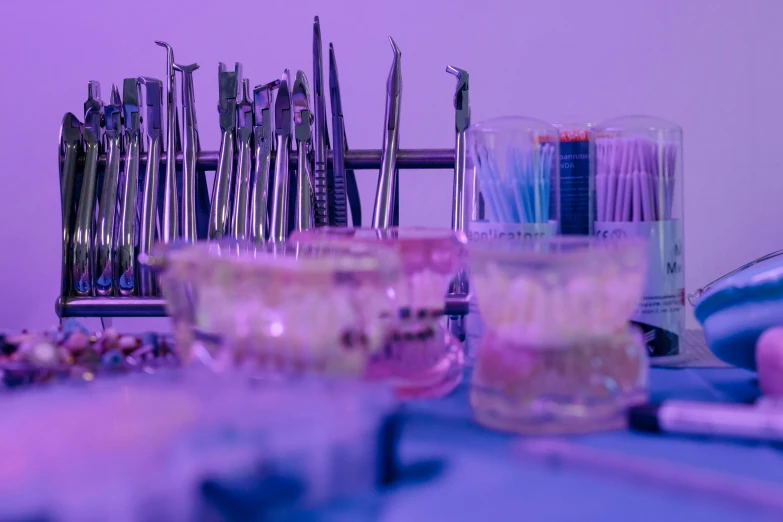 a close up view of plastic cup, spoon and other metal objects