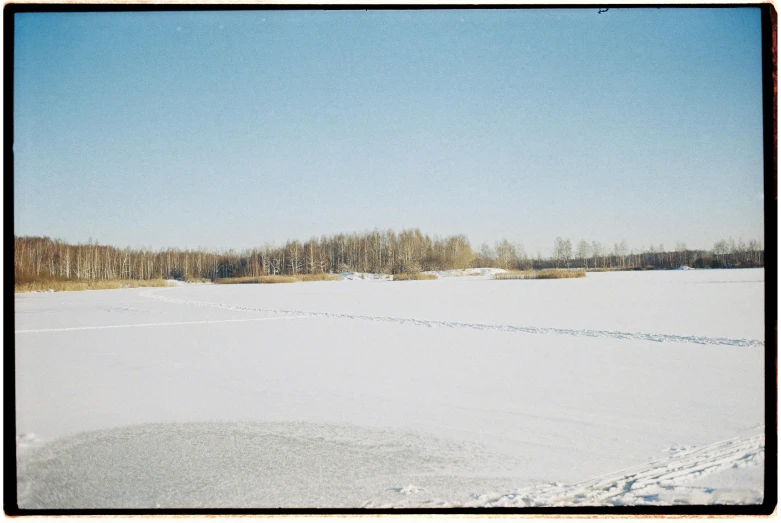 a snowboarder doing a trick on the slope