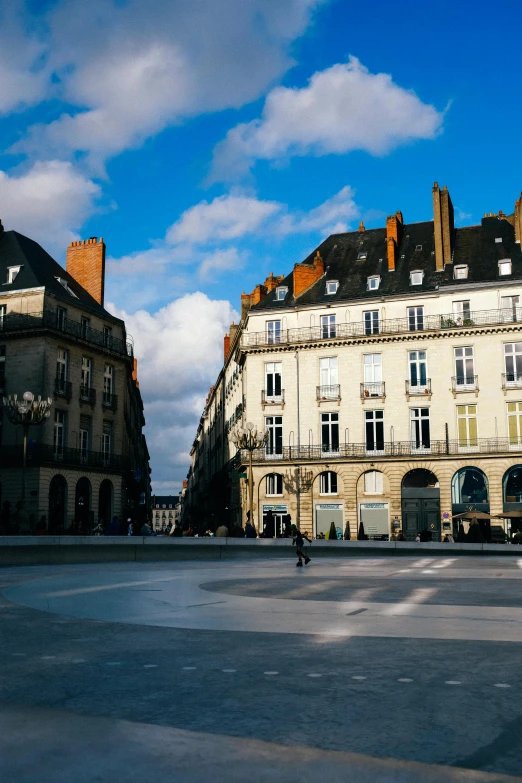 a wide square in an old city with buildings