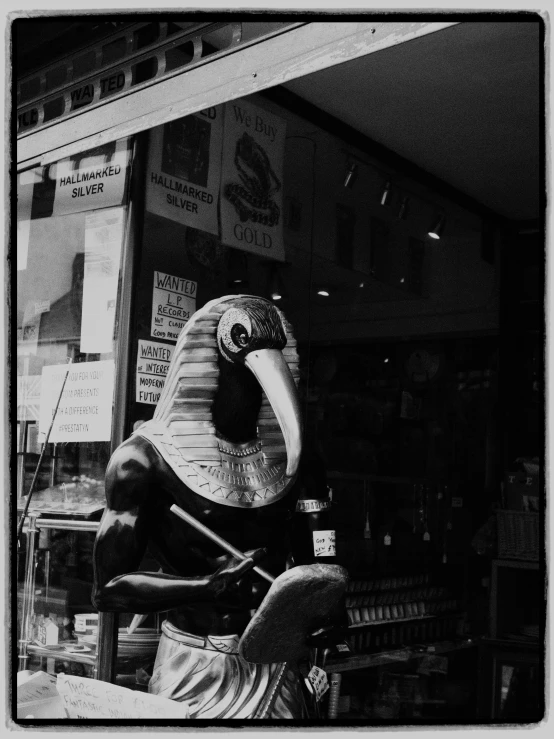 the sculpture of an antelope in a window