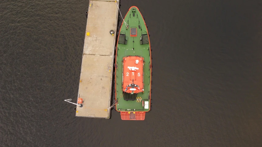 two boats are parked on the dock