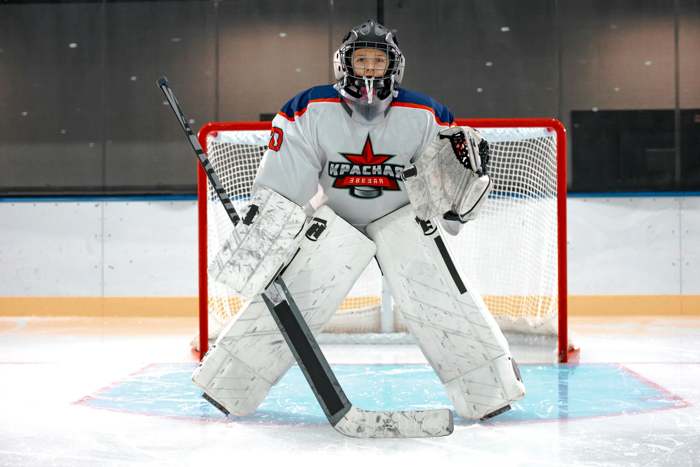 a hockey goalie waiting for the next puck to come