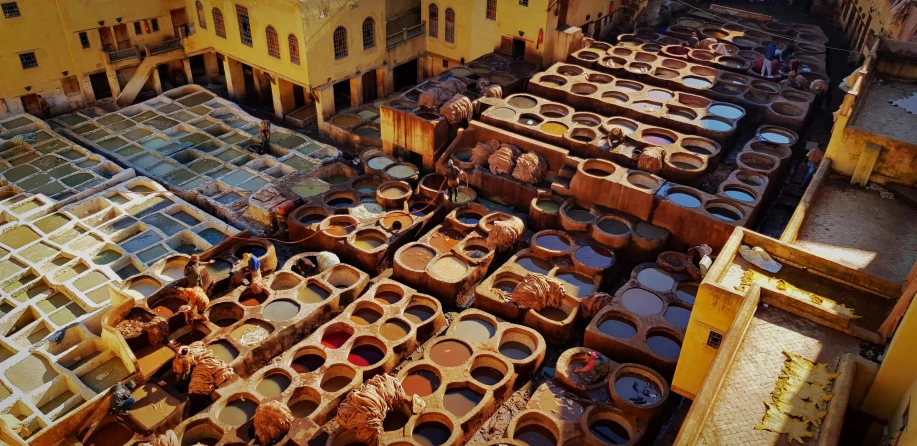 a factory filled with lots of brown vases