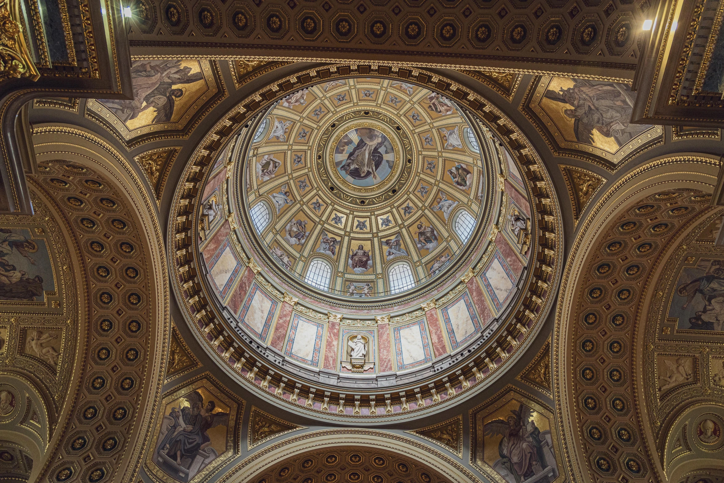 ceiling of building with large dome, decorated ceiling and painted walls