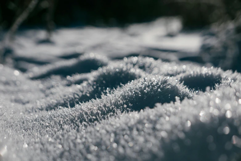 there is a close up po of snow that is very shiny