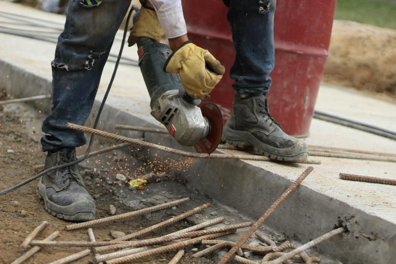 a person  nails with a small machine