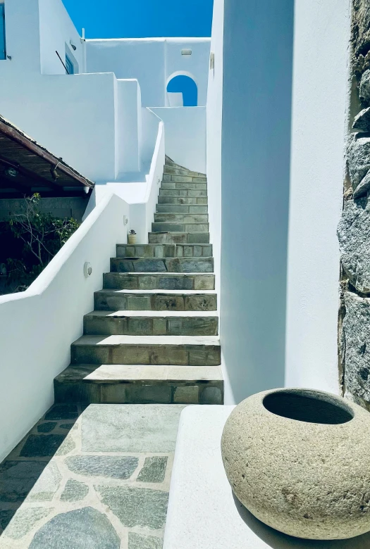 a set of stone steps to an outdoor bathroom