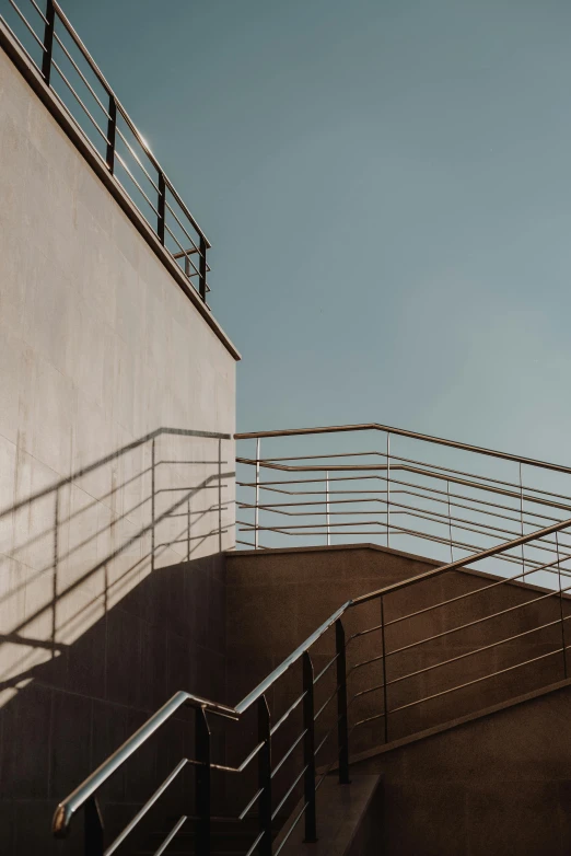 the man rides his skateboard down stairs