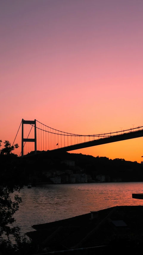 the large bridge has many traffic lights on it