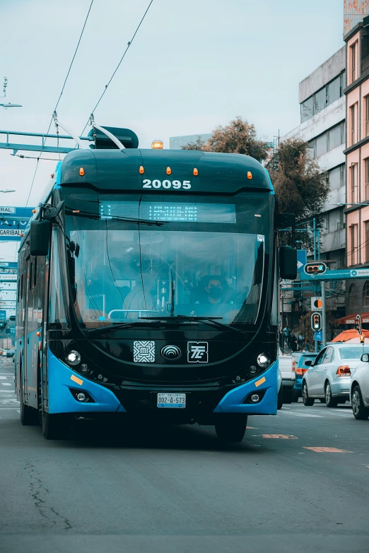 a bus is moving down the street in traffic