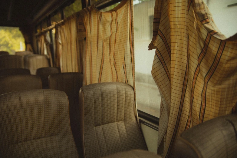 an interior view of a passenger train that appears to be parked at the station