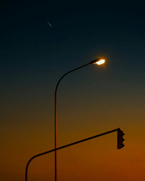 the street light is lit with a single dot of sunlight