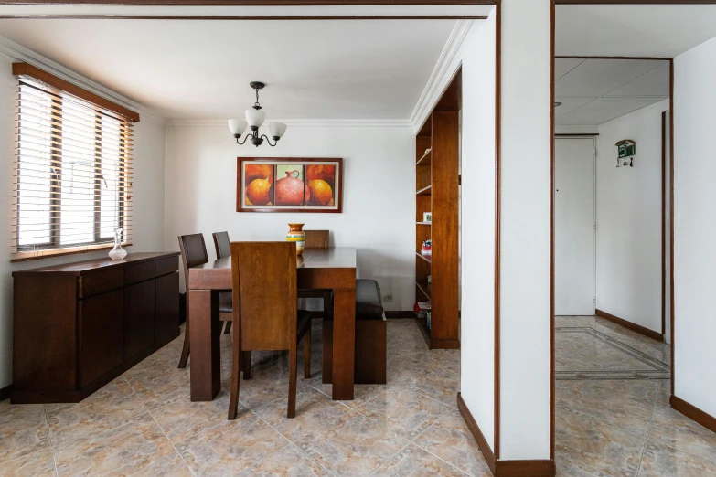 an elegant dining table sitting in a well decorated room