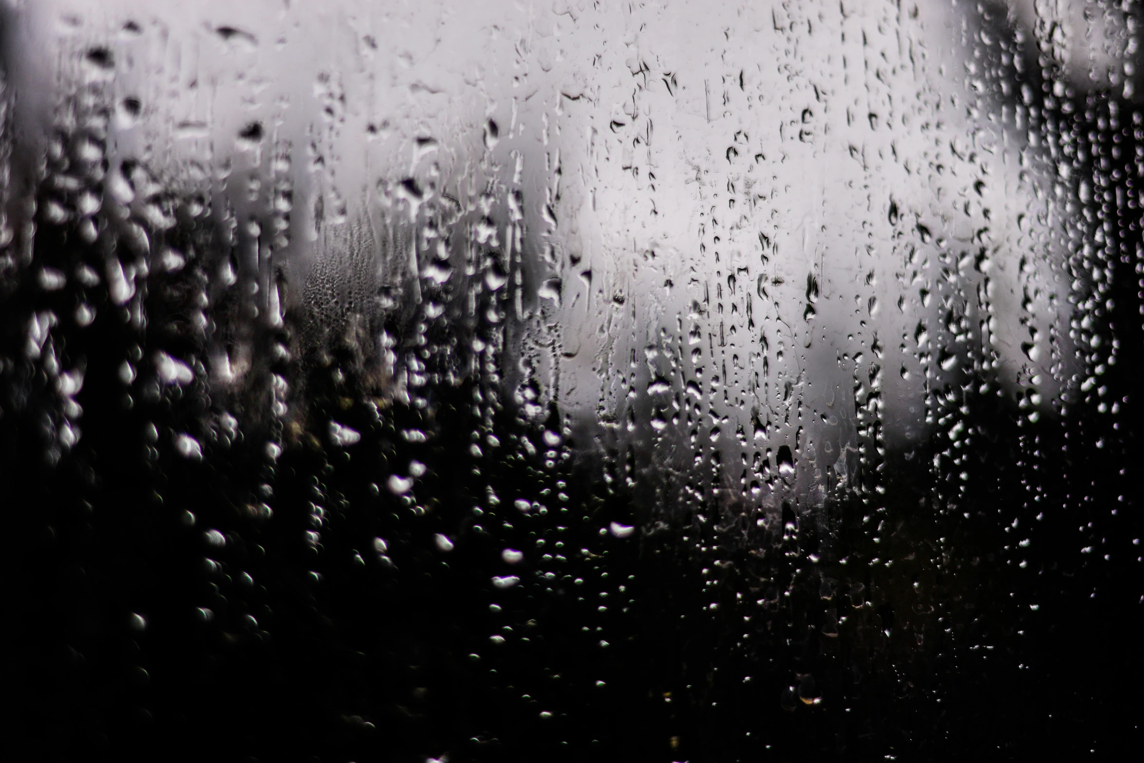 a window that has rain droplets on it